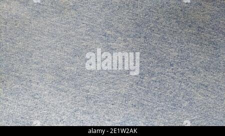 La texture du denim, bleu-gris décoloré et versé Banque D'Images