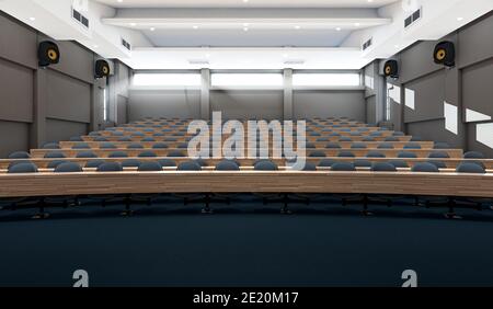 Un intérieur d'un auditorium de salle de conférence vide avec des rangées de bureaux et de chaises en bois incurvés éclairés par la lumière du soleil du matin - rendu 3D Banque D'Images