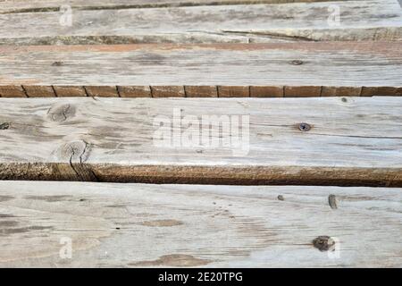 Texture d'un arrière-plan abstrait de banc gris en bois. Banque D'Images