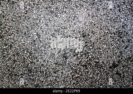 texture d'un sol en terrazzo tacheté noir et blanc Banque D'Images