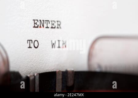 Entrez pour gagner une phrase écrite avec une machine à écrire. Banque D'Images