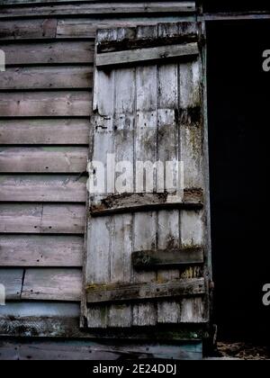 Porte de chargement au premier étage sur l'ancienne grange de Westbury, Wiltshire, Angleterre, Royaume-Uni. Banque D'Images