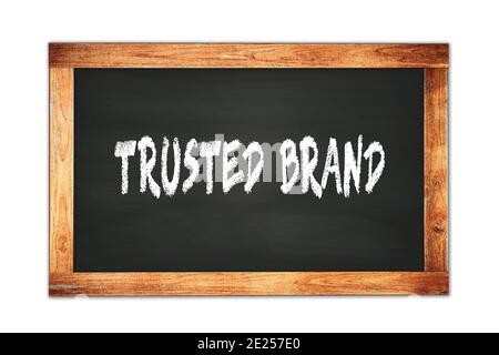 TEXTE DE MARQUE DE CONFIANCE écrit sur le tableau noir de l'école de cadre en bois. Banque D'Images