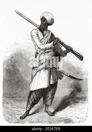 Portrait de Hazara alpiniste, Inde. Voyage au Punjab et au Cachemire par Guillaume Lejean. Ancienne gravure El Mundo en la Mano 1878 Banque D'Images