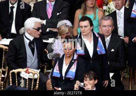 Karl Lagerfeld, Helene Mercier-Arnault et Bernard Arnault assistent au mariage du Prince Albert II de Monaco et de Charlene Wittstock dans le Cour d’Honneur au Palais de Monte Carlo, Monaco, le 02 juillet 2011. Photo de Frédéric Nebinger/ABACAPRESS.COM Banque D'Images