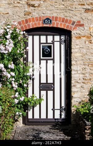 Porte d'entrée du cottage Period Cotswold, Tetbury, Gloucestershire, Royaume-Uni Banque D'Images