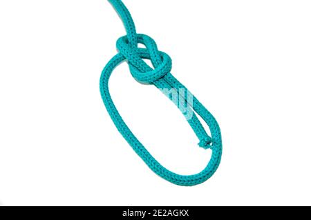 Bowline Knot sur fond blanc un des noeuds de boucle les plus utilisés. Comme il ne glisse pas, il est utilisé pour le sauvetage Banque D'Images