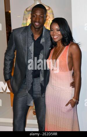 Dwyane Wade et Gabrielle Union arrivent pour le Rodeo Drive Walk of style Award en l'honneur d'Iman et de Missoni qui se sont tenus à Missoni à Beverly Hills, Los Angeles, CA, États-Unis le 23 octobre 2011. Photo de Tony DiMaio/ABACAPRESS.COM Banque D'Images