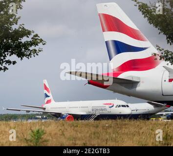 Garés hors d'usage avions British Airways entreposés à l'aéroport international de Bournemouth, Dorset, pendant la crise du coronavirus le 9 juin 2020 Banque D'Images