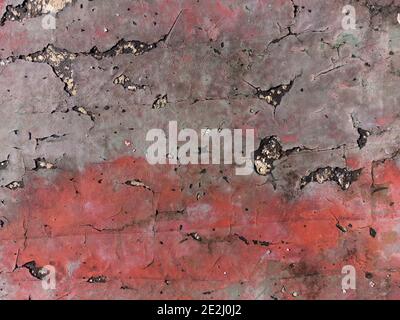 Rayures craquelées grunge béton rouge plancher vue du dessus texture papier peint arrière-plan Banque D'Images