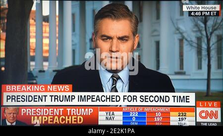 Une capture d'écran de CNN montre le correspondant de la Maison Blanche Jim Acosta en réaction à la deuxième destitution du président américain Donald Trump. Banque D'Images
