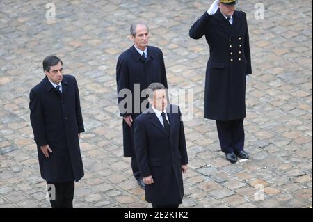 Le président français Nicolas Sarkozy, François Fillon et Hubert Falco lors des funérailles de l'ancien ministre et président du Parlement Philippe Seguin à l'église Saint-Louis des Invalides à Paris, France, le 11 janvier 2010. Photo de Mousse/ABACAPRESS.COM Banque D'Images