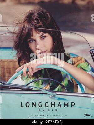 Affiche publicitaire de Longchamp maison de la mode avec Alexa Chung en version papier du magazine de l'année 2014, une publicité, une publicité à partir d'Longchamp créatifs 2010s Banque D'Images