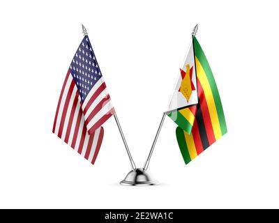 Drapeaux de bureau, États-Unis d'Amérique et Zimbabwe, isolés sur fond blanc. image 3d Banque D'Images