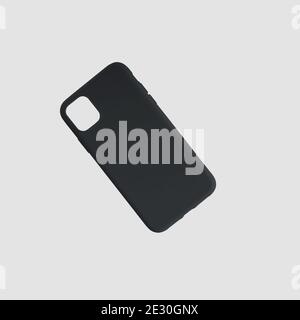 Modèle d'un contenant noir pour un téléphone mobile, pour la publicité dans un magasin en ligne. Cache en plastique Mockup pour smartphone, isolé sur fond blanc Banque D'Images