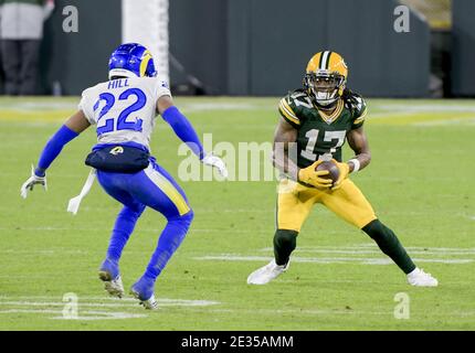 Green Bay, États-Unis. 16 janvier 2021. Los Angeles Rams Corner back Troy Hill (22) cherche à s'attaquer au grand receveur Davante Adams de Green Bay Packers (17) au cours du quatrième trimestre de la Divisional Playoff à Lambeau Field, à Green Bay, Wisconsin, le samedi 16 janvier 2021. Les Green Bay Packers ont battu les Los Angeles Rams 32-18. Photo par Mark Black/UPI crédit: UPI/Alay Live News Banque D'Images
