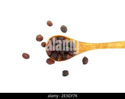 Fruit de Crataegus communément appelé aubépine, épine-épine, arbre de mai, orme blanc ou épine-corne. Cure pour le coeur. Herbes médicinales séchées isolées sur la merde Banque D'Images