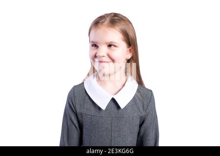 Écolière dans un uniforme d'affaires. Isolé sur fond blanc. Photo de haute qualité Banque D'Images