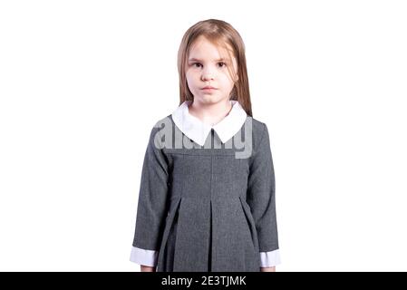 Écolière dans un uniforme d'affaires. Isolé sur fond blanc. Photo de haute qualité Banque D'Images