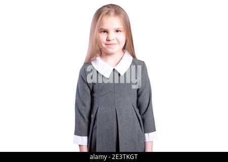 Écolière dans un uniforme d'affaires. Isolé sur fond blanc. Photo de haute qualité Banque D'Images