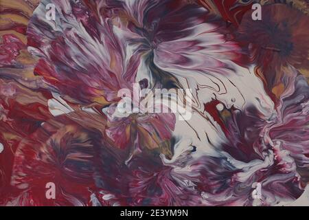 Fond de coulée de peinture de type floral avec une riche couleur fluide peinte d'une manière experte Banque D'Images