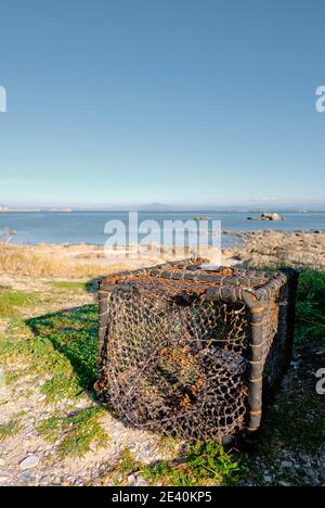 Plan vertical d'une gabion corde à chaînette sur le soleil plage Banque D'Images