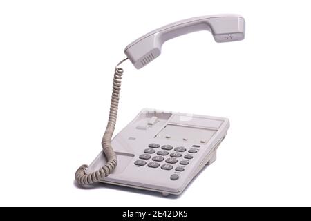 Téléphone vintage avec combiné téléphonique à levier isolé sur fond blanc