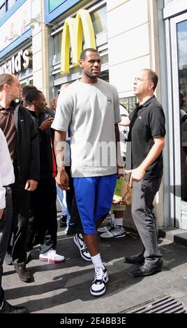 Lebron James of the Cleveland Cavaliers leaving the McDonald's on Place  Clichy in Paris, France on September 2nd, 2009 and inaugurating a  playground with 9th District's Mayor Jacques Bravo. Photo by ABACAPRESS.COM