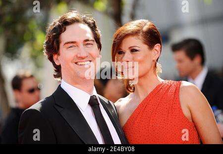 Debra Messing et Daniel Zelman arrivent au 61ème Primetime Emmy Awards, qui s'est tenu au Nokia Theatre de Los Angeles, CA, Etats-Unis, le 20 septembre 2009. Photo de Lionel Hahn/ABACAPRESS.COM (en photo : Debra Messing, Daniel Zelman) Banque D'Images