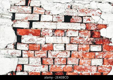 fragment de vieux mur de briques en fricles gros plan avec rétro-éclairage Banque D'Images