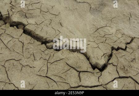 Fissures dans le sable sec photo en gros plan Banque D'Images