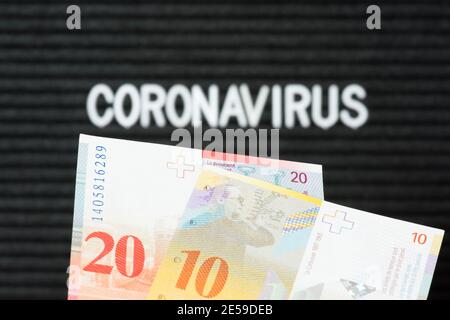 Argent francs suisses et virus Corona en Suisse Banque D'Images