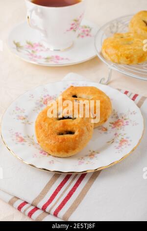 Gâteaux d'Eccles une petite pâtisserie ronde remplie de raisins de Corinthe ou Raisins secs originaires de la ville d'Eccles dans le Lancashire Angleterre Banque D'Images