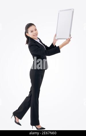 Femme d'affaires avec tableau blanc photo de haute qualité