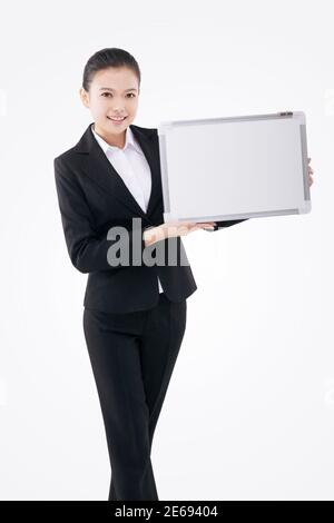 Femme d'affaires avec tableau blanc photo de haute qualité