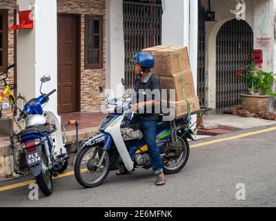 George Town, Penang, Malaisie: Ville historique rues animées plein de magasins et maisons coloniales et de la nourriture de rue Banque D'Images
