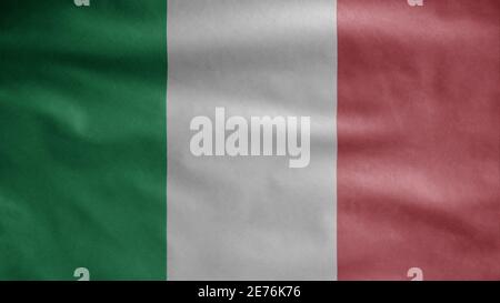 Drapeau italien agitant dans le vent. Gros plan de la bannière italienne soufflant, doux et lisse soie. Tissu texture ensign arrière-plan. Utilisez-le pour le d national Banque D'Images