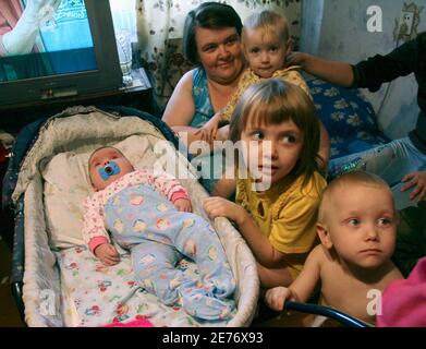 Nadia Khalina Possibly The World S Fattest Baby Lies In A Pram With Her Mother Tatyana L Father Viktor R And Her Siblings In Their Apartment In The Siberian City Of Aleisk October