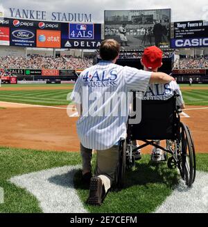 Austin Goldsmith hugs his father 