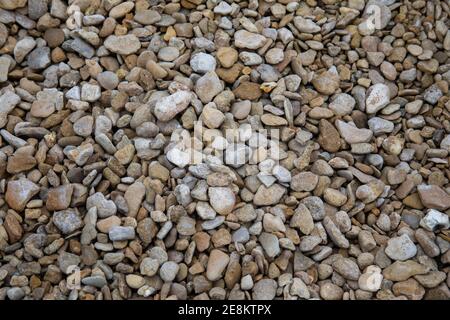 Gros plan du gravier Cerney Shingle à vendre à a Builders Merchants en Angleterre, au Royaume-Uni Banque D'Images