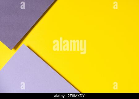Arrière-plan géométrique abstrait en jaune, gris clair et gris foncé Banque D'Images