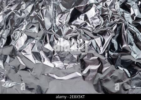 fond de plan plat en aluminium froissé avec mise au point sélective. Banque D'Images