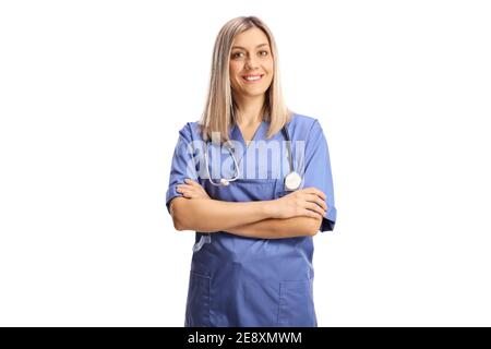 Femme de soins de santé dans un uniforme bleu souriant à caméra isolée sur fond blanc Banque D'Images