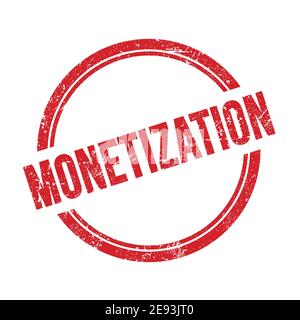Texte DE MONÉTISATION écrit sur un timbre rond rouge grungy vintage. Banque D'Images