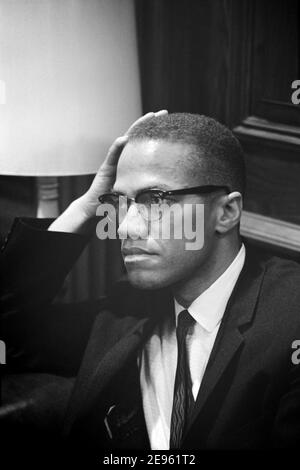 Malcolm X attendant à la conférence de presse Martin Luther King, Head and Shoulders Portrait, Marion S. Trikosko, 26 mars 1964 Banque D'Images