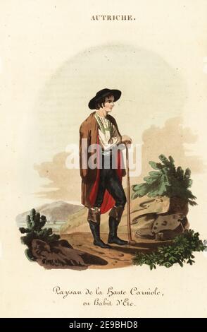 Paysan de Slovénie (haute Carniola), en robe d'été, XVIIIe siècle. Il porte un chapeau à large bord, un manteau de grenouille marron sur ses épaules, une chemise blanche, des culottes et des bottes, et porte un bâton. Paysan de la haute Carniole, en habitude d'ete. Gravure sur plaque de coperplate de couleur main, d'après une illustration de William Alexander de J-B. Eyries’ l'Autriche: Costumes, Moeurs et usages des Autrichiens, Autriche: Costumes, mœurs et mœurs des Autrichiens, Librairie de Gide fils, Paris, 1823. Jean-Baptiste Eyries (1767-1846) est un géographe, auteur et traducteur français. Banque D'Images