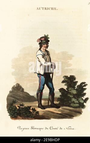 Jeunesse slave du pays de Nitra, Royaume de Hongrie (Slovaquie), XVIIIe siècle. Il porte une robe de fête, un chapeau avec des rubans, une veste brodée, des pantaloons bleus, des demi-bottes hongroises avec un tuyau de tabac dans la droite. Homme slavonien du comté de Neutra, Paysan Slovaque du Comte de Neutra. Gravure sur plaque de coperplate de couleur main, d'après une illustration de William Alexander de J-B. Eyries’ l'Autriche: Costumes, Moeurs et usages des Autrichiens, Autriche: Costumes, mœurs et mœurs des Autrichiens, Librairie de Gide fils, Paris, 1823. Jean-Baptiste Eyries (1767-1846) était un géographe français, Banque D'Images