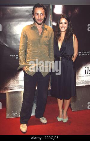 Les acteurs Olivia Bonamy et Michael Cohen posent à la première de leur nouveau film "ils" qui s'est tenu au cinéma UGC cite les Halles à Paris, en France, le 17 juillet 2006. Photo de Mehdi Taamallah/ABACAPRESS.COM. Banque D'Images