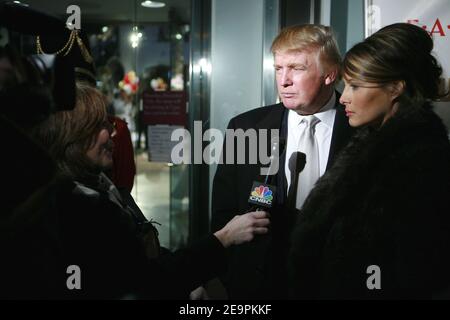 Donald et Melania Trump arrivent pour la célébration de l'anniversaire de Vanessa & Donanld Trump Jr. Pour soutenir l'opération Smile, qui s'est tenue dans le magasin FAO Schwartz à New York City, NY, États-Unis, le 11 décembre 2006. Photo de Gerald Holubowicz/ABACAPRESS.COM Banque D'Images