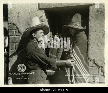 DOUGLAS FAIRBANKS Sr dans HEADIs' SOUTH 1918 directeurs ALLAN DWAN Et ARTHUR ROSSEN perdu film silencieux Douglas Fairbanks photos / Artcraft Pictures Corporation Banque D'Images